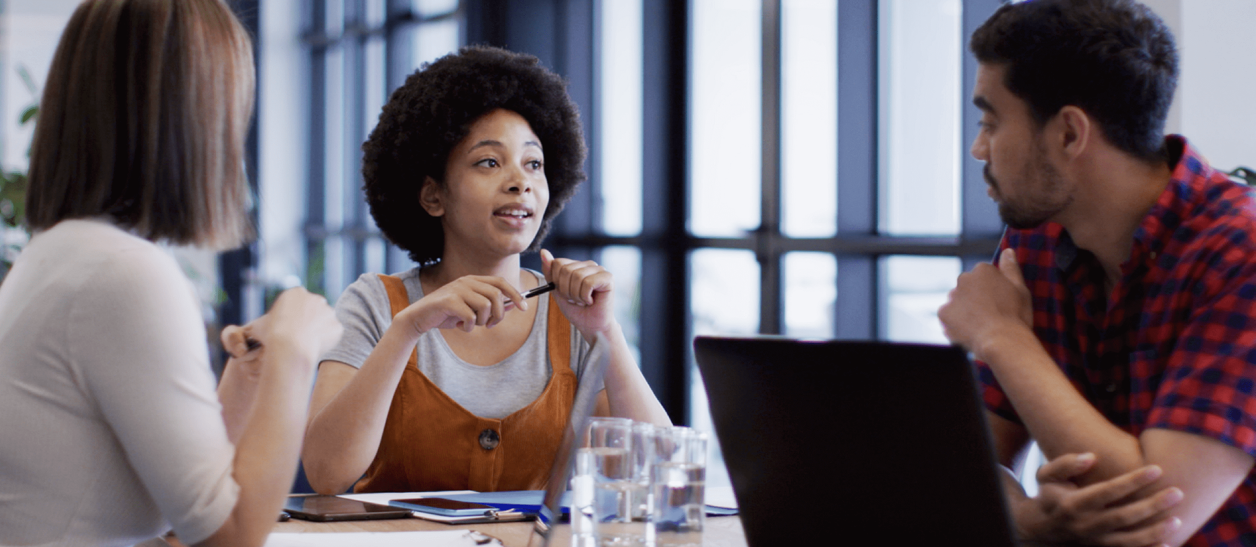 young man working on laptop on his desk